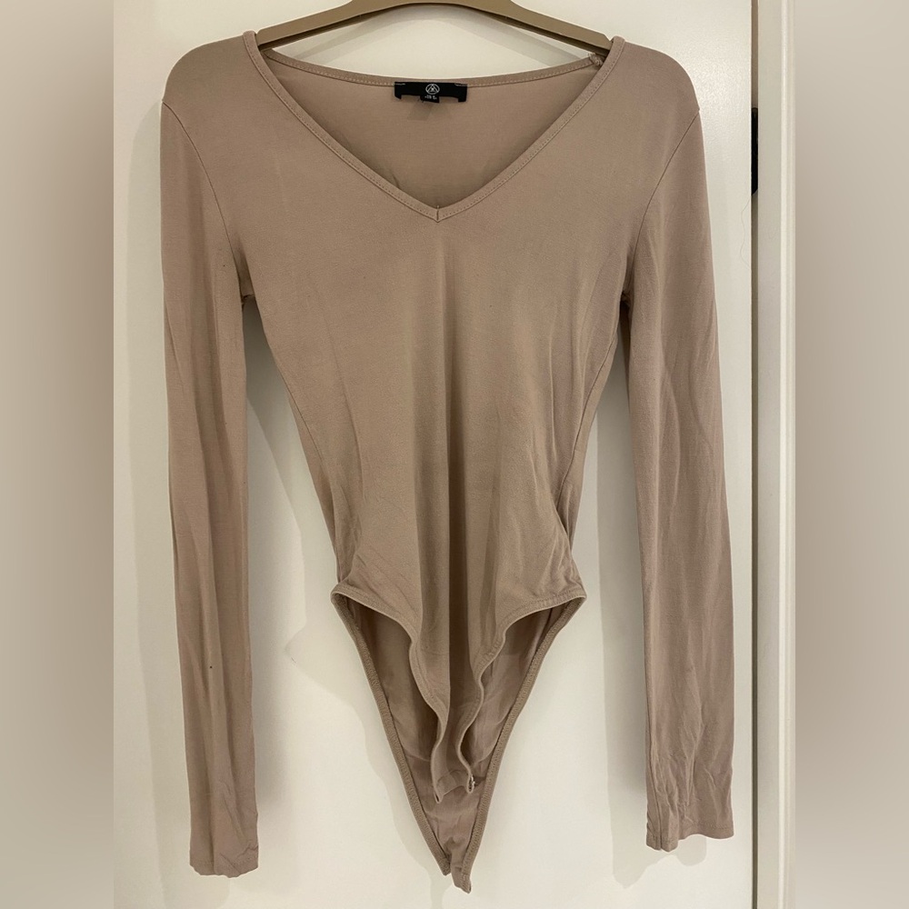 Missguided, snap body suit. V neck. Size 4 (like a small).